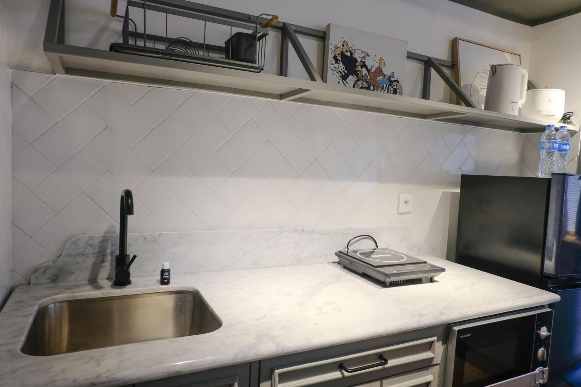 Apartemen With Private Living At Jarrdin Cihampelas By Travelio *